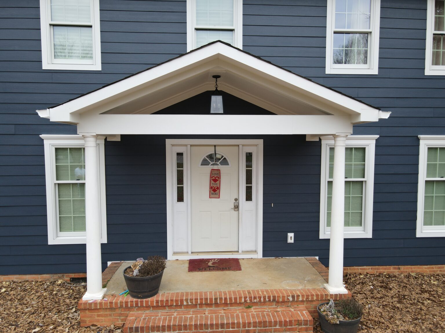 blue james hardie on entryway