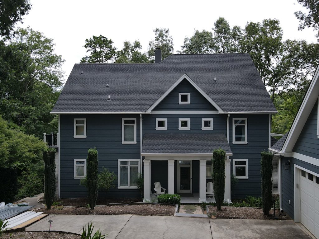 Get new roofing on your blue home with local Anderson roofing contractor C&W