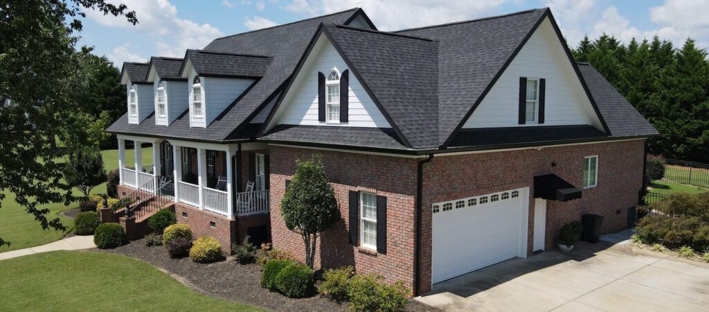 Home with new roofing asphalt shingles on a house in Seneca, SC