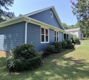 A Greenville, SC home transformed with Harbor Blue ASCEND Composite Cladding and new vinyl replacement windows by C&W Roofing, Siding & Window Co.